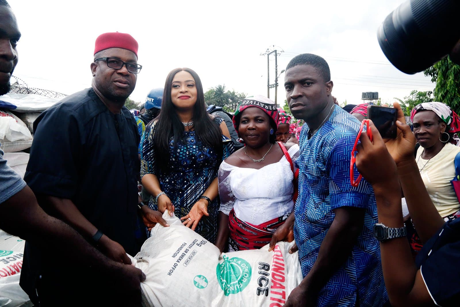 Widows at Oraifite, Anambra State, receiving rice distributed by the Foundation at Easter