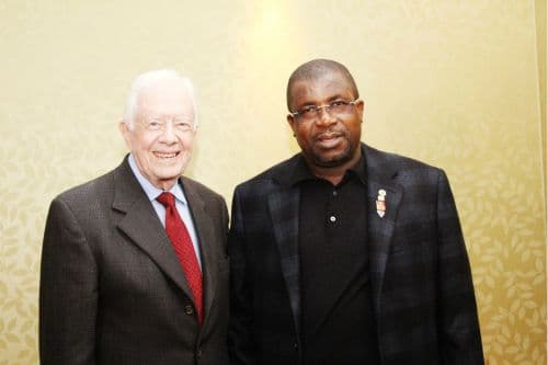 Former United States President Jimmy Carter and Sir Emeka Offor meeting in London