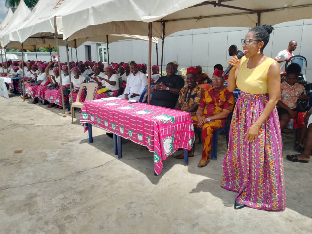 Widows at Oraifite, Anambra State, receiving 50kg bags of rice from the Sir Emeka Offor Foundation at Easter
