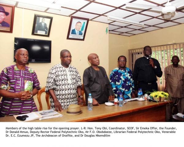 Scholarship beneficiaries receiving their cheques from the Sir Emeka Offor Foundation at Oraifite, Anambra State
