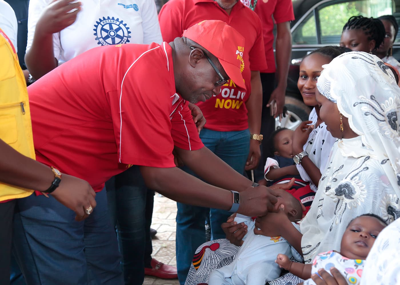 Sir Emeka Offor immunising a child during World Polio Day activities with Rotary International