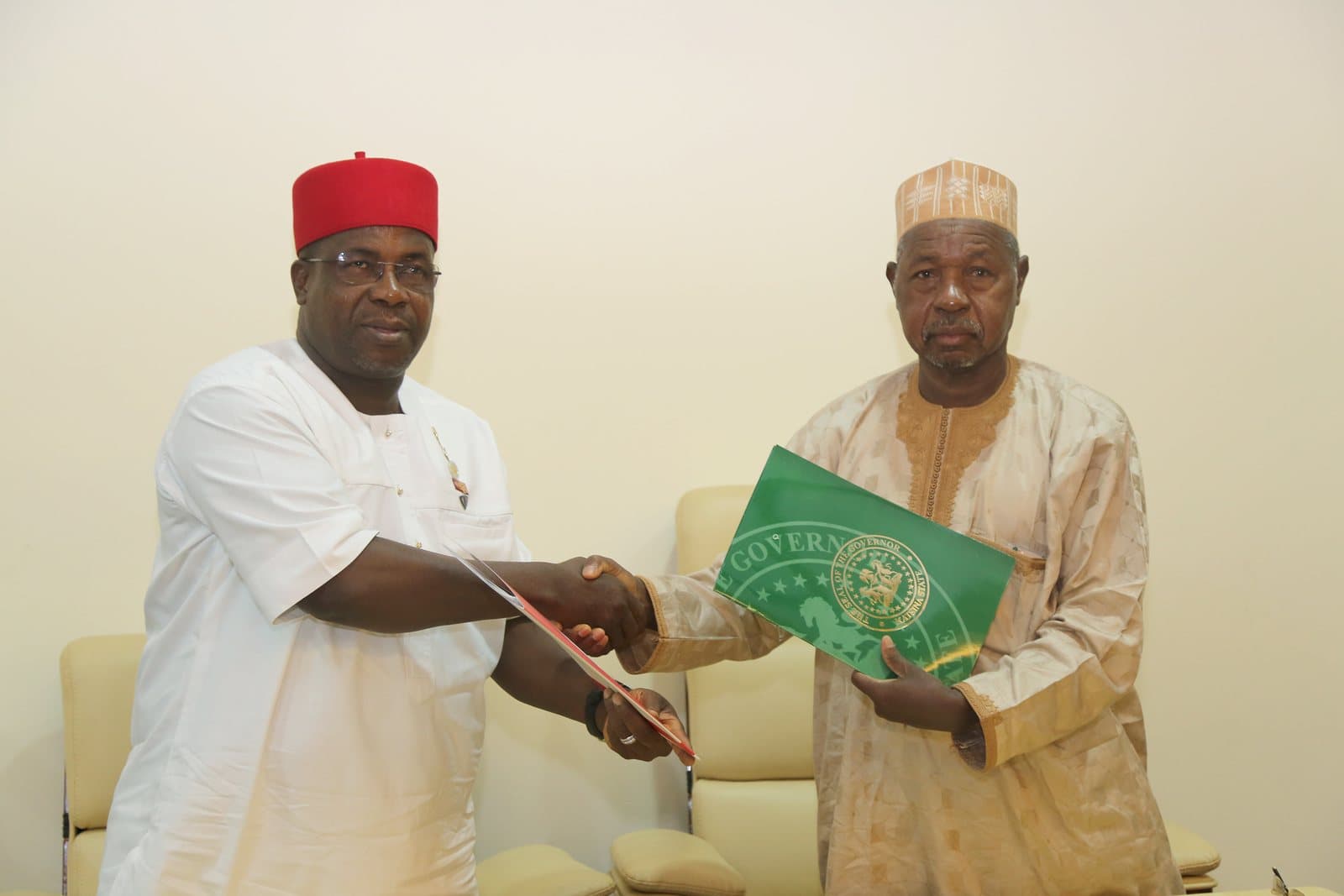 Sir Emeka Offor and Governor Aminu Bello Masari at the signing of a Memorandum of Understanding with Katsina State Government in Abuja