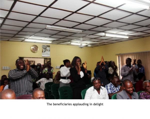 Scholarship beneficiaries receiving their cheques at Oraifite, Anambra State